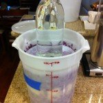Weighing down with a lid